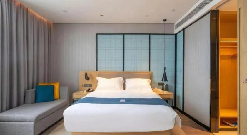 Bed in Echarm Hotel Hefei Binhu Exhibition Center