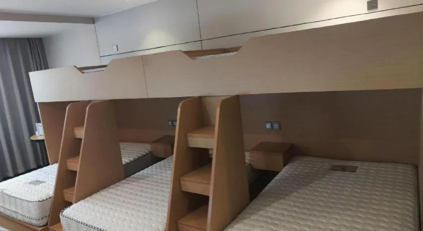 Bed in Echarm Hotel Hefei Binhu Exhibition Center