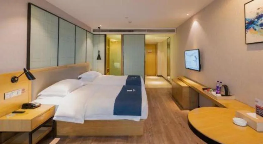 Bed in Echarm Hotel Hefei Binhu Exhibition Center