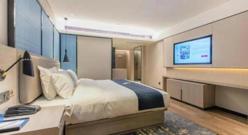 Bed in Echarm Hotel Hefei Binhu Exhibition Center