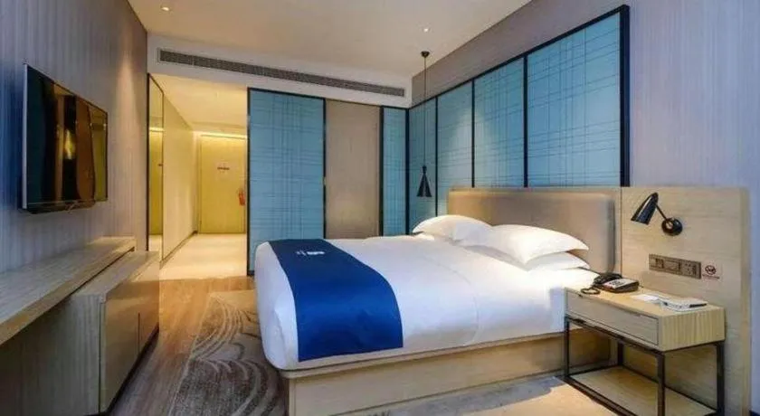 Bed in Echarm Hotel Hefei Binhu Exhibition Center