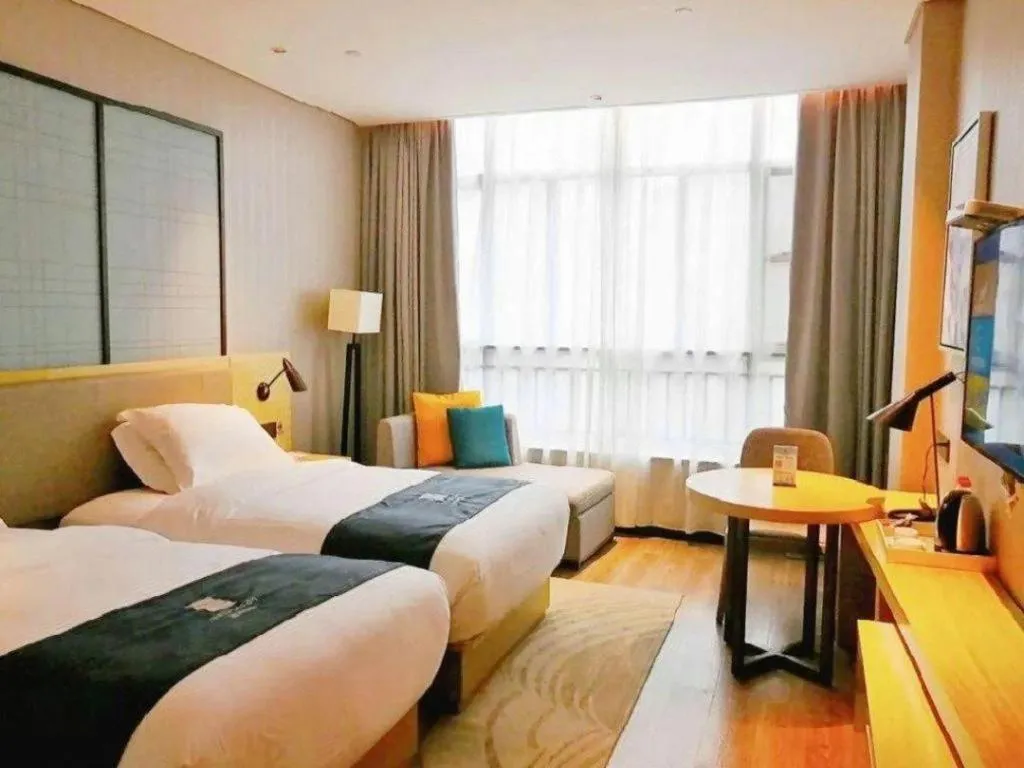 Bed in Echarm Hotel Hefei Binhu Exhibition Center