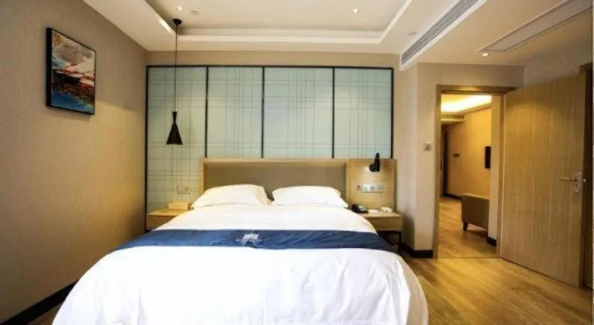 Bed in Echarm Hotel Hefei Binhu Exhibition Center