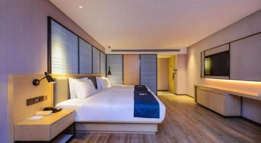 Bed in Echarm Hotel Hefei Binhu Exhibition Center