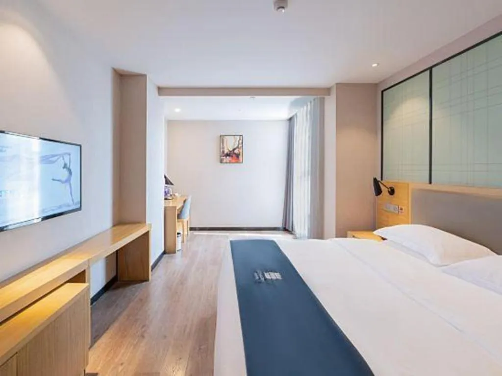 Bed in Echarm Hotel Hefei Binhu Exhibition Center