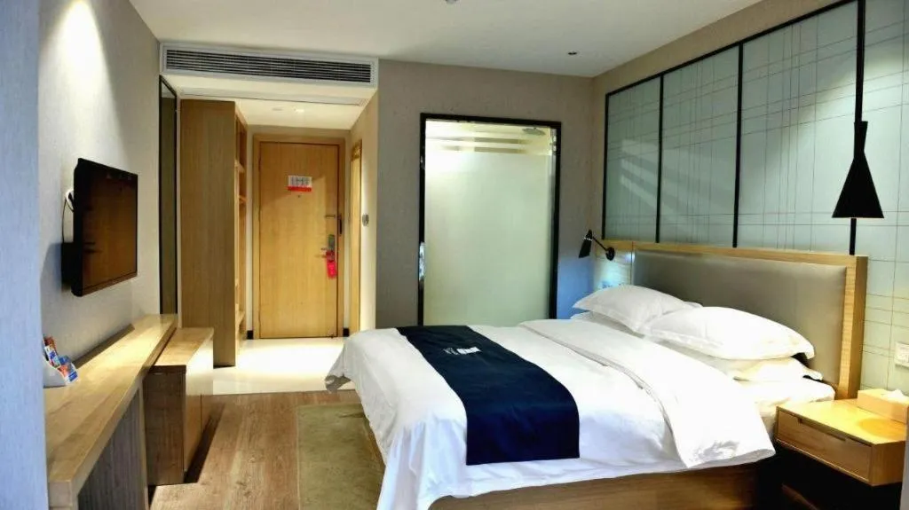 Bed in Echarm Hotel Hefei Binhu Exhibition Center