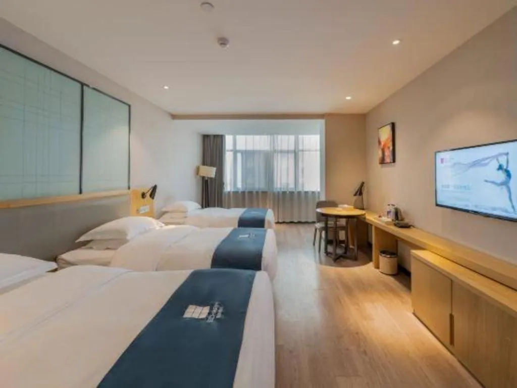 Bed in Echarm Hotel Hefei Binhu Exhibition Center