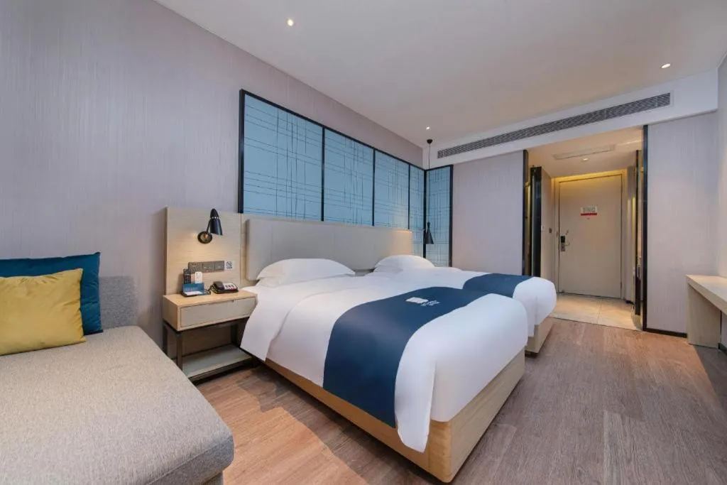 Bed in Echarm Hotel Hefei Binhu Exhibition Center