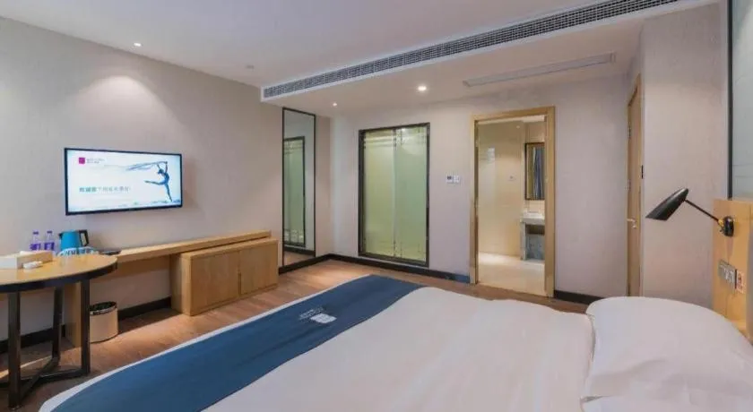 Bed in Echarm Hotel Hefei Binhu Exhibition Center