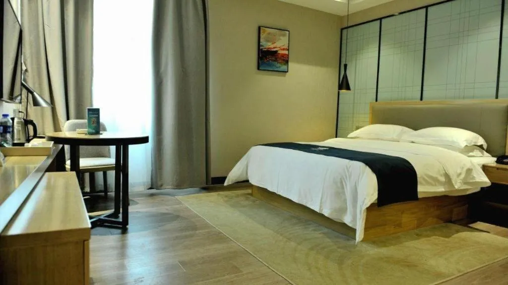 Bed in Echarm Hotel Hefei Binhu Exhibition Center