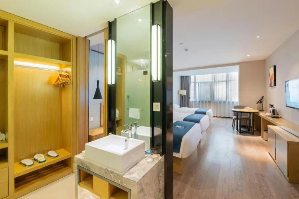 Bed in Echarm Hotel Hefei Binhu Exhibition Center