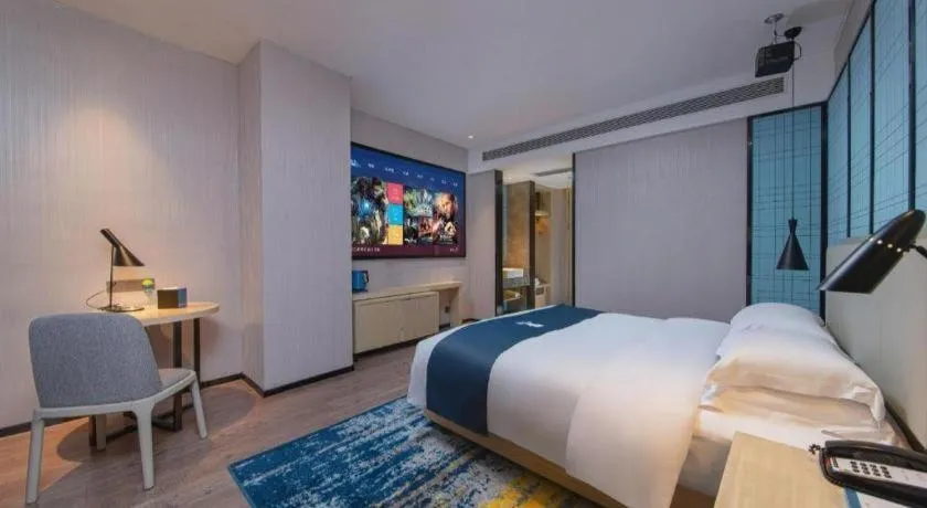 Bed in Echarm Hotel Hefei Binhu Exhibition Center