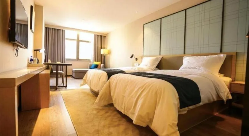 Bed in Echarm Hotel Hefei Binhu Exhibition Center