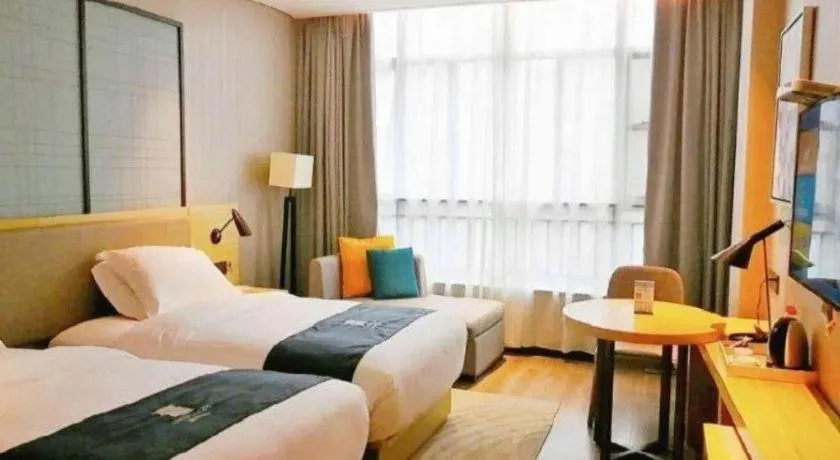 Bed in Echarm Hotel Hefei Binhu Exhibition Center