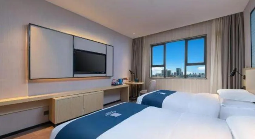 Bed in Echarm Hotel Hefei Binhu Exhibition Center