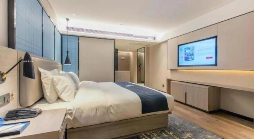 Bed in Echarm Hotel Hefei Binhu Exhibition Center