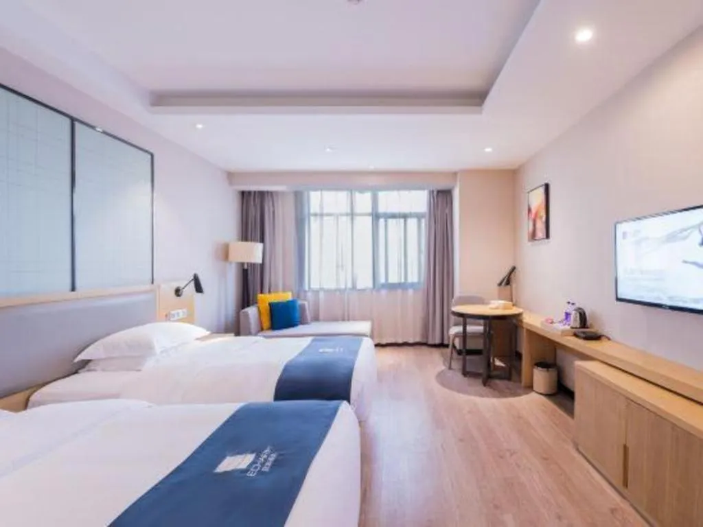 Bed in Echarm Hotel Hefei Binhu Exhibition Center