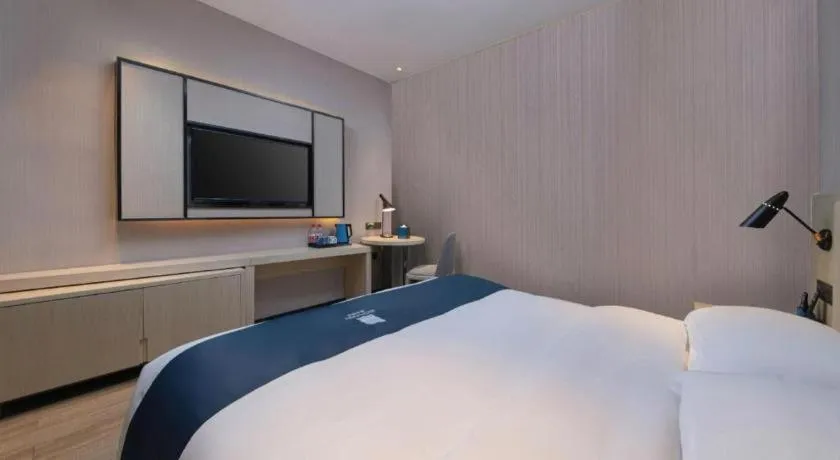 Bed in Echarm Hotel Hefei Binhu Exhibition Center