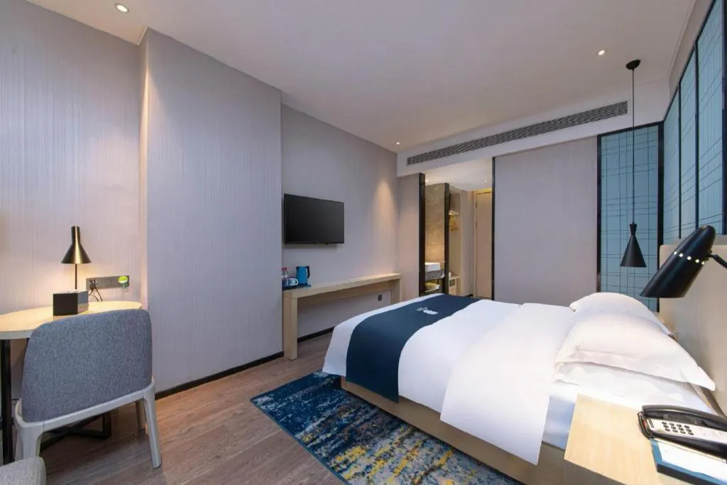 Bed in Echarm Hotel Hefei Binhu Exhibition Center