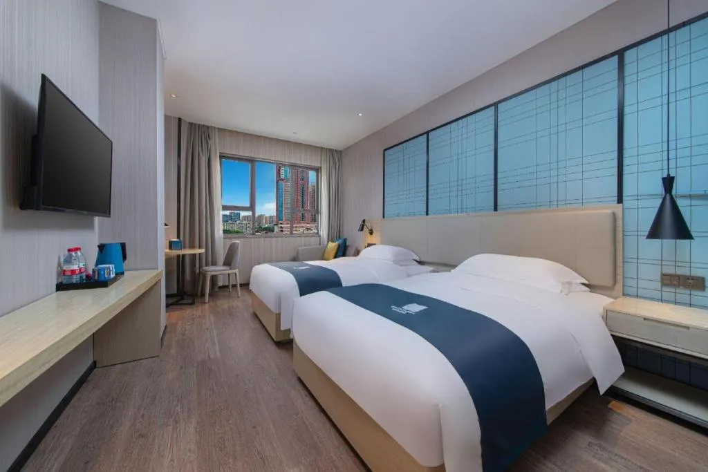 Bed in Echarm Hotel Hefei Binhu Exhibition Center