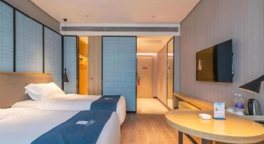 Bed in Echarm Hotel Hefei Binhu Exhibition Center