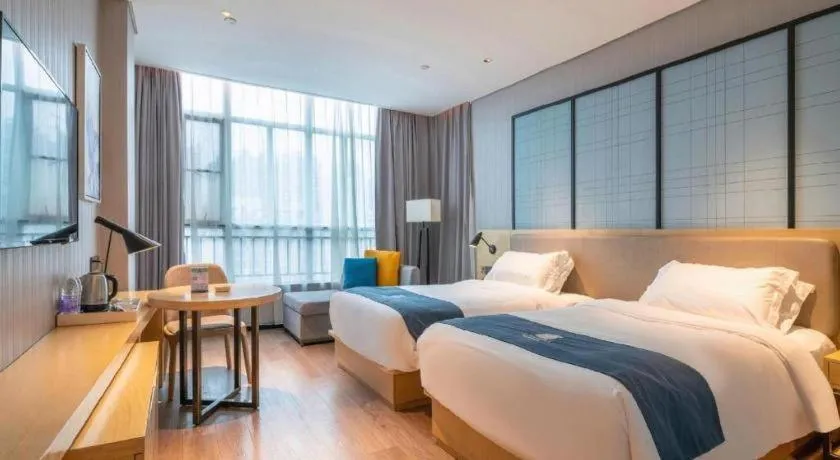 Bed in Echarm Hotel Hefei Binhu Exhibition Center