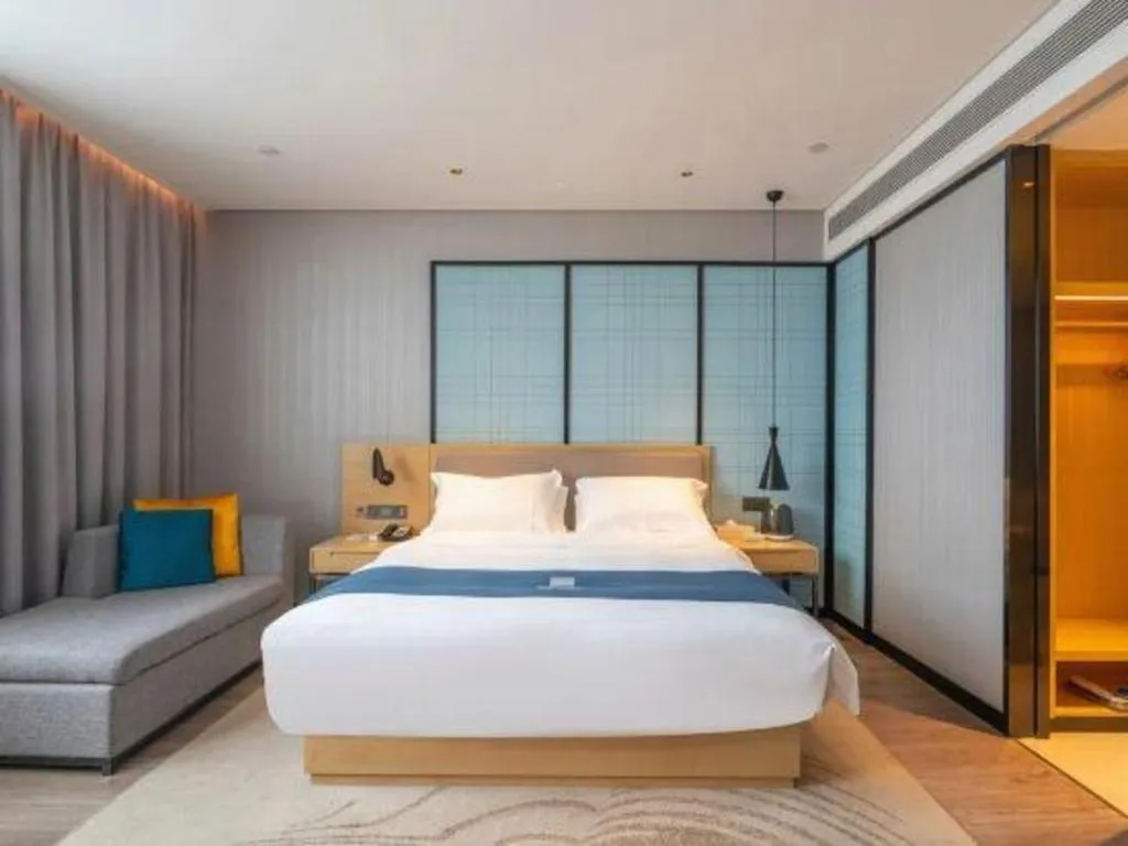 Bed in Echarm Hotel Hefei Binhu Exhibition Center