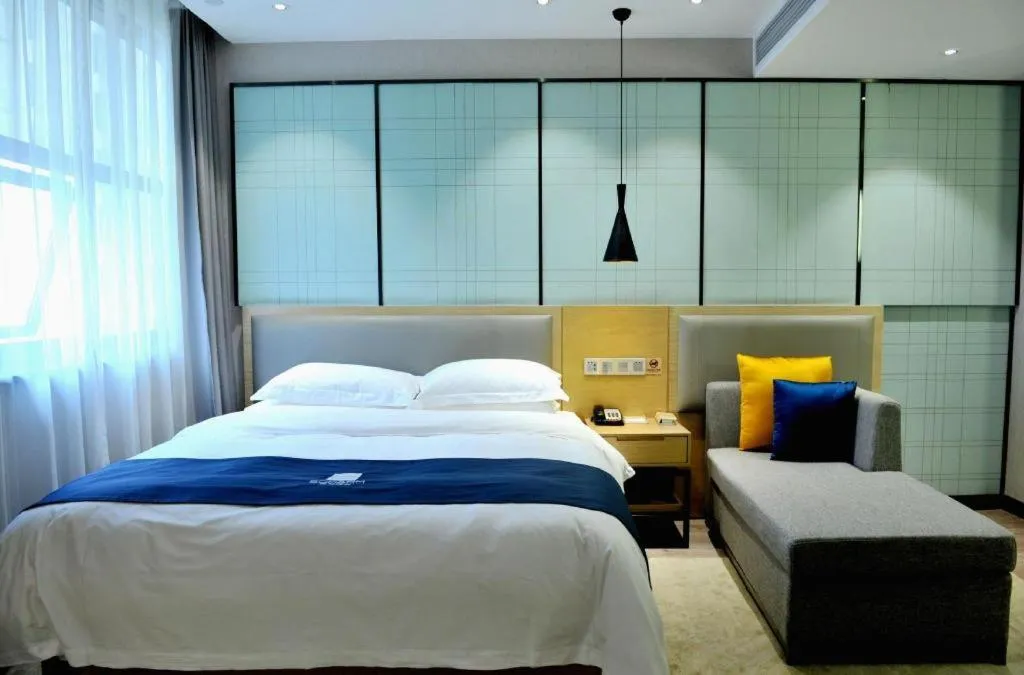 Bed in Echarm Hotel Hefei Binhu Exhibition Center