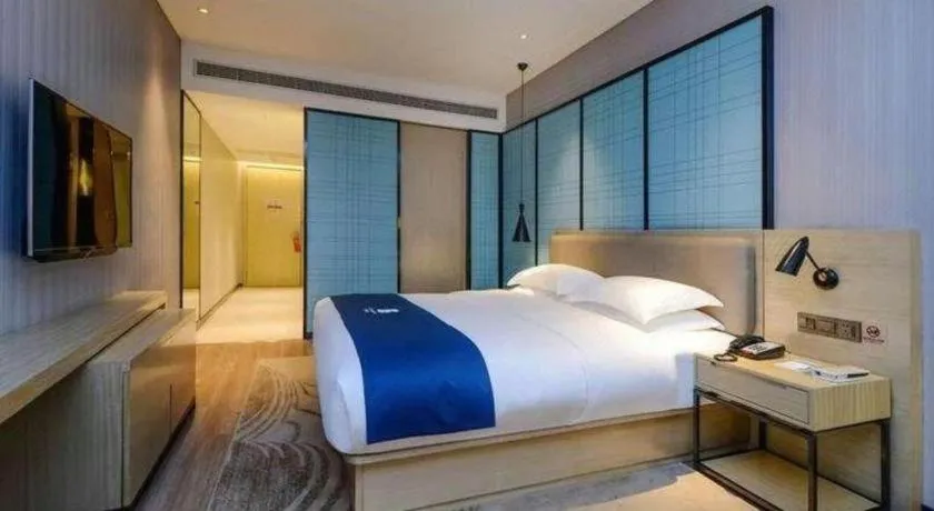 Bed in Echarm Hotel Hefei Binhu Exhibition Center