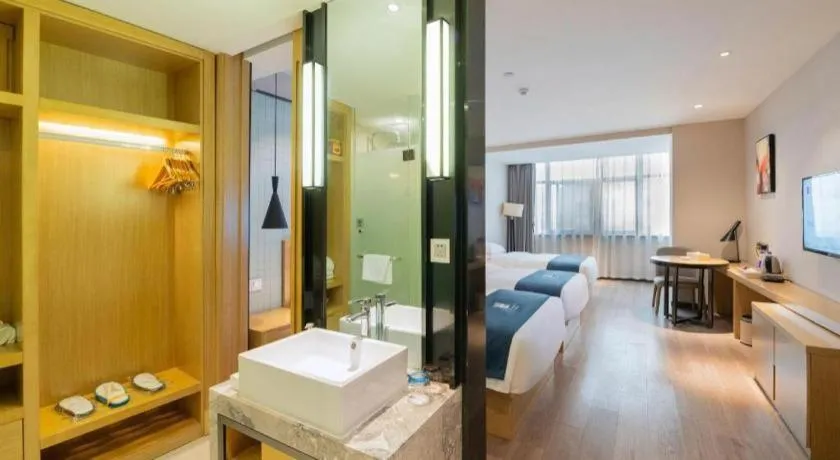 Bed in Echarm Hotel Hefei Binhu Exhibition Center