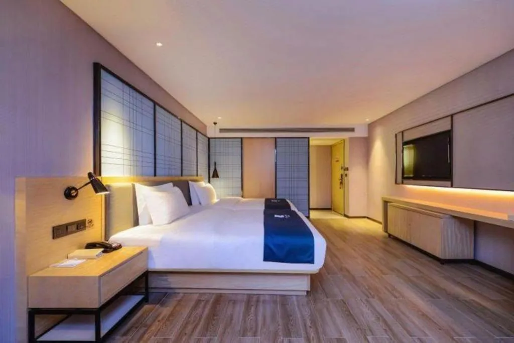 Bed in Echarm Hotel Hefei Binhu Exhibition Center