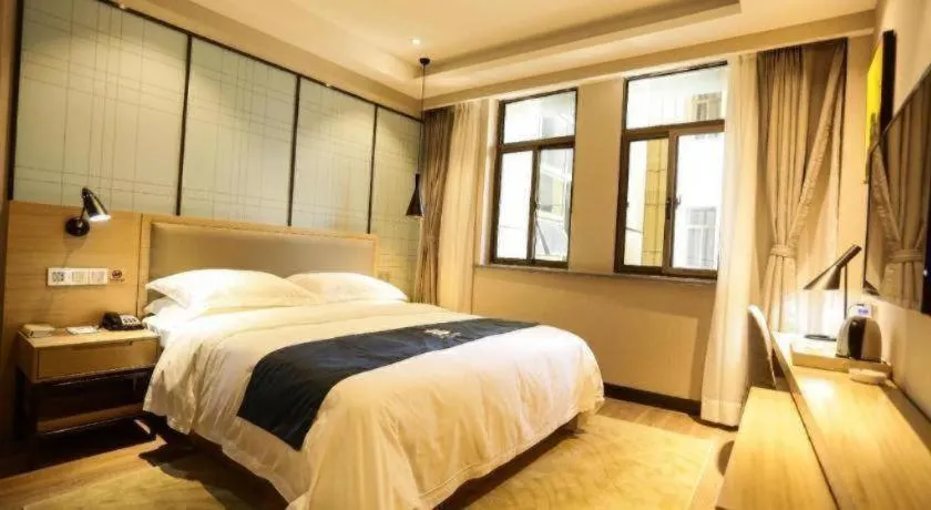 Bed in Echarm Hotel Hefei Binhu Exhibition Center