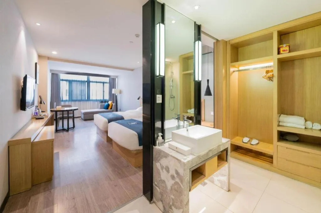 Bed in Echarm Hotel Hefei Binhu Exhibition Center