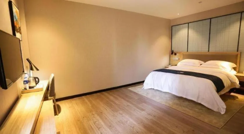 Bed in Echarm Hotel Hefei Binhu Exhibition Center