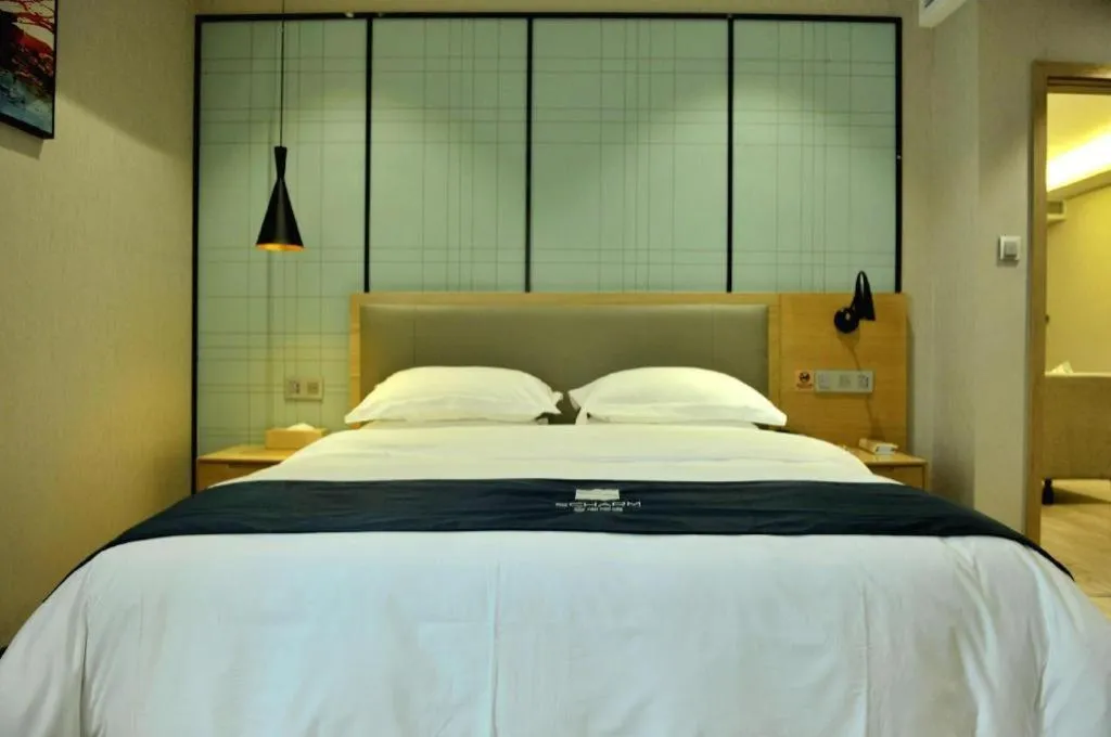 Bed in Echarm Hotel Hefei Binhu Exhibition Center