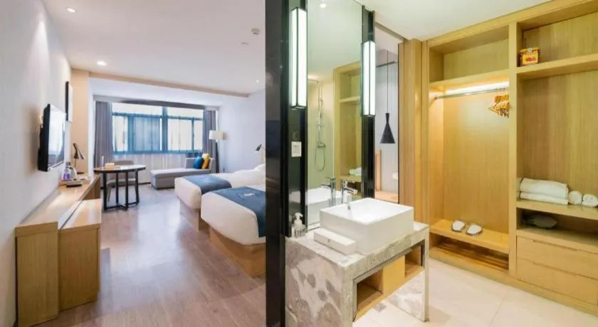 Bed in Echarm Hotel Hefei Binhu Exhibition Center