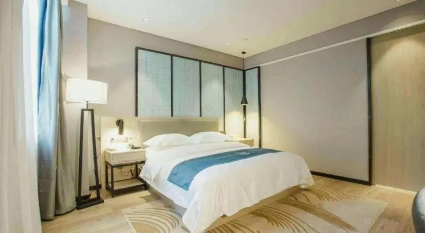 Bed in Echarm Hotel Hefei Binhu Exhibition Center