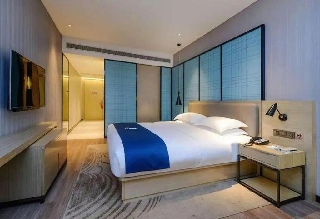 Bed in Echarm Hotel Hefei Binhu Exhibition Center