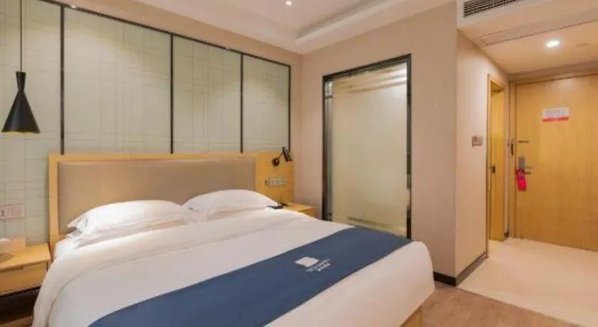 Bed in Echarm Hotel Hefei Binhu Exhibition Center
