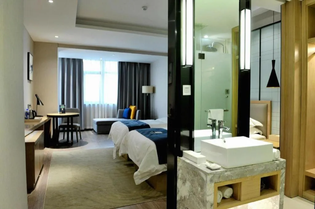 Bed in Echarm Hotel Hefei Binhu Exhibition Center