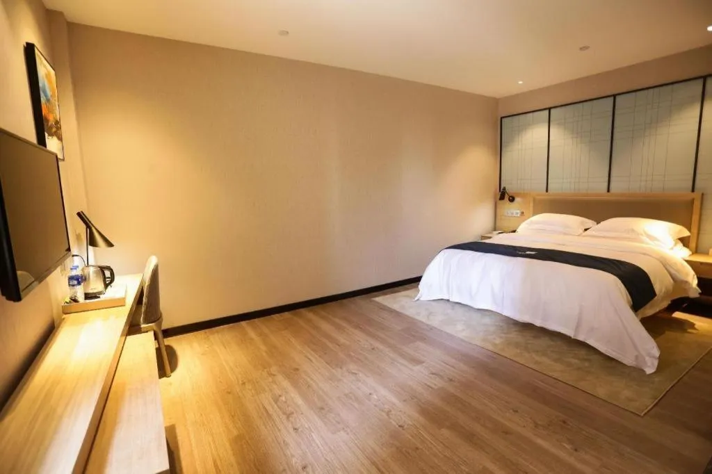 Bed in Echarm Hotel Hefei Binhu Exhibition Center