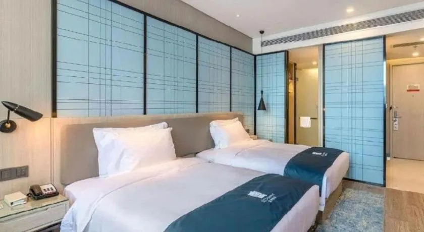 Bed in Echarm Hotel Hefei Binhu Exhibition Center