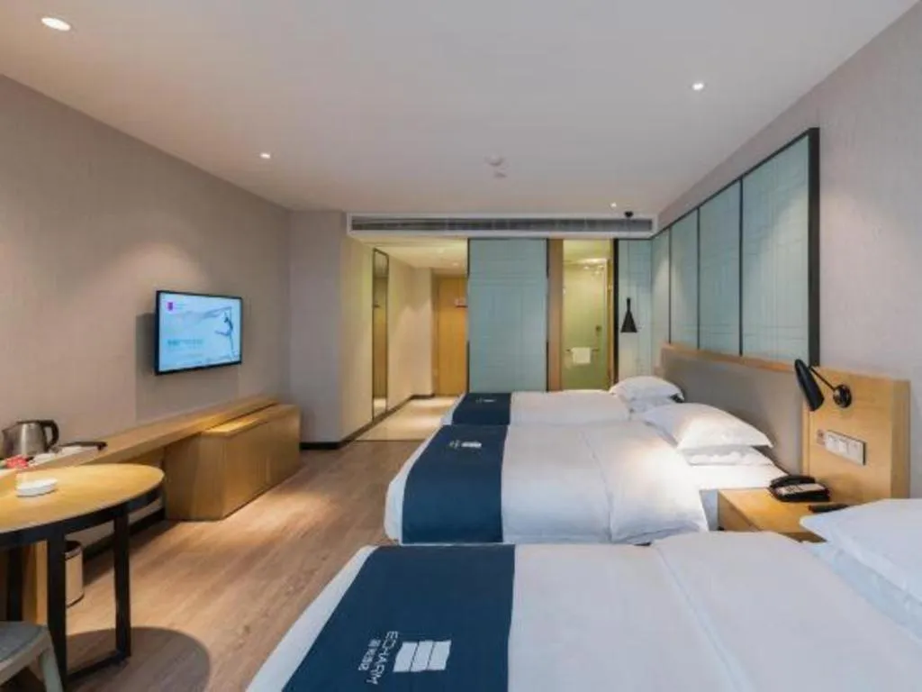 Bed in Echarm Hotel Hefei Binhu Exhibition Center