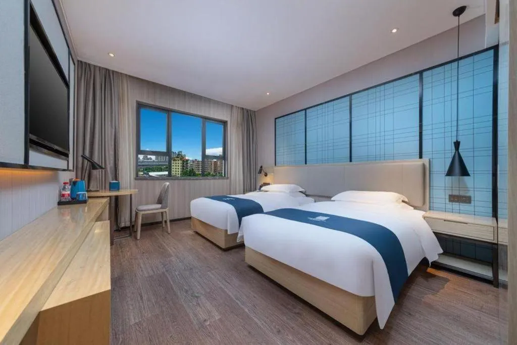 Bed in Echarm Hotel Hefei Binhu Exhibition Center