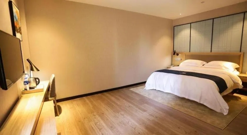 Bed in Echarm Hotel Hefei Binhu Exhibition Center