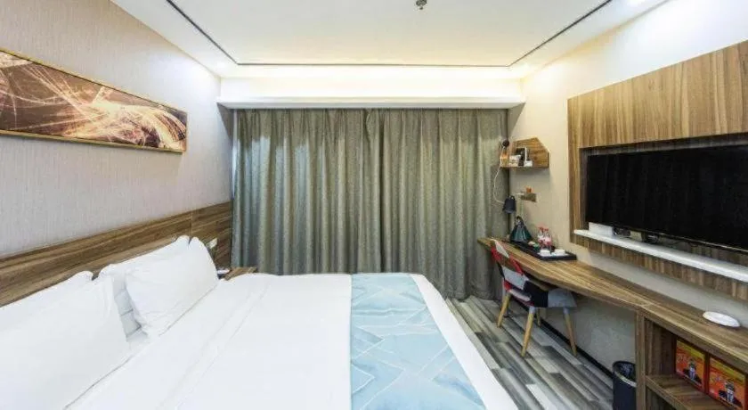 Bed in Borrman Hotel Zhenjiang Dashikou Suning Plaza