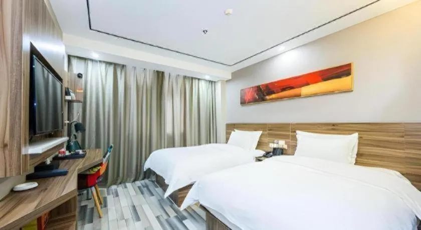 Bed in Borrman Hotel Zhenjiang Dashikou Suning Plaza