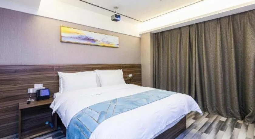 Bed in Borrman Hotel Zhenjiang Dashikou Suning Plaza