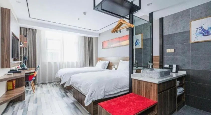 Bed in Borrman Hotel Zhenjiang Dashikou Suning Plaza