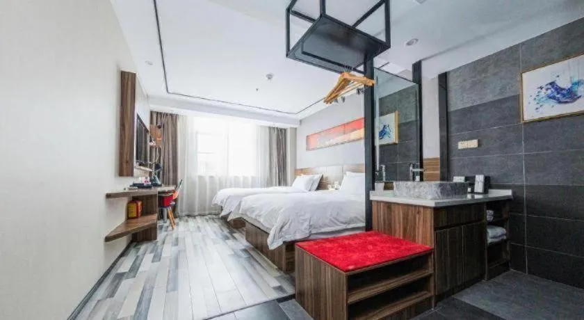 Bed in Borrman Hotel Zhenjiang Dashikou Suning Plaza